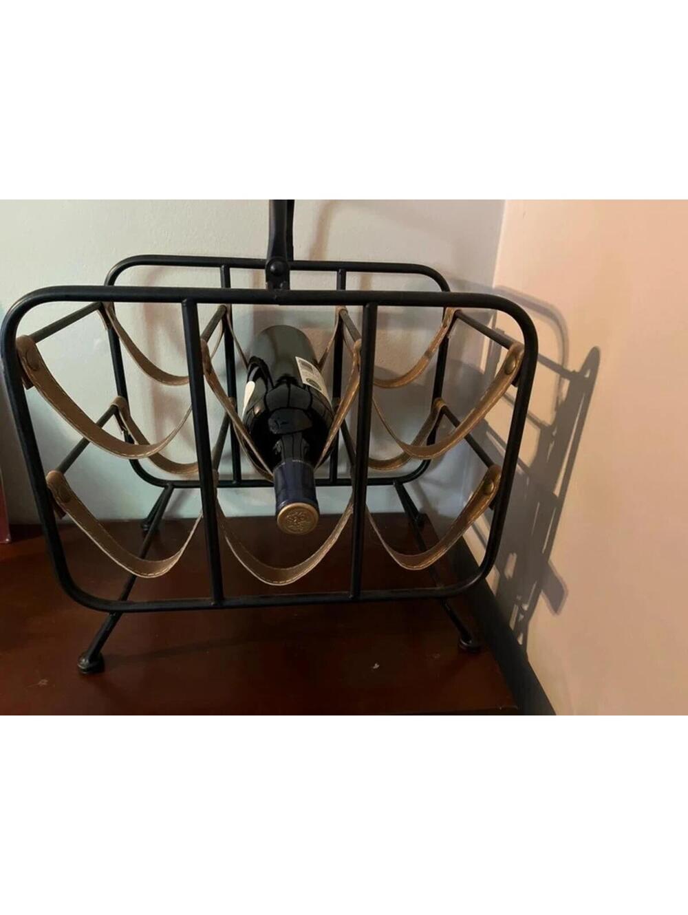 Iron wine rack with leather straps